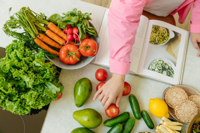 Fresh whole foods including vegetables, fruits, and natural ingredients for therapeutic nutrition